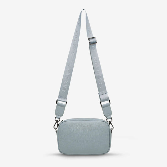 Plunder with Branded Webbed Strap in Powder Blue by Status Anxiety - The Stockroom NZ
